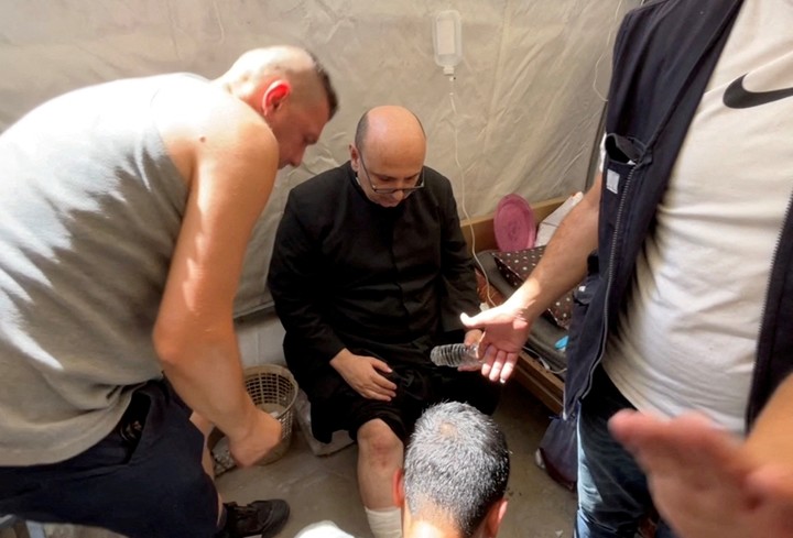 Gabriel Romanelli, recibe ayuda médica tras el ataque. Dawoud Abu Alkas, Reuters.